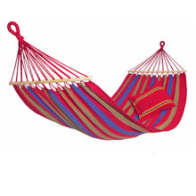 Load image into Gallery viewer, A red, purple, and green striped Aruba Cayenne Hammock, with wooden spreader bars, fully extended.